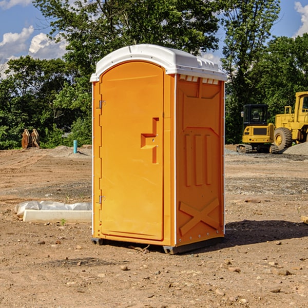 how often are the portable restrooms cleaned and serviced during a rental period in Lund NV